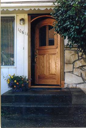 Oak door with panels and arch