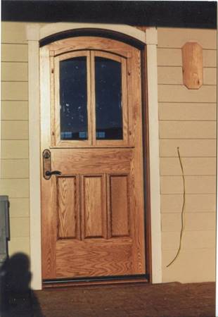 Oak door with panels and arch